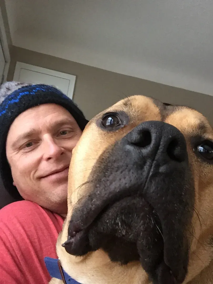 Todd and a very close dog